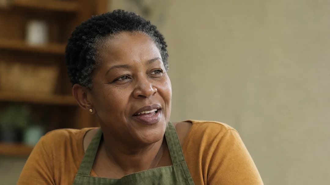 Portrait of a middle-aged volunteer in an apron